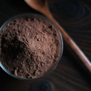 Premium dark chocolate flakes made from Malaysian single-origin cacao for baking, decorating desserts and rich drinking chocolate.